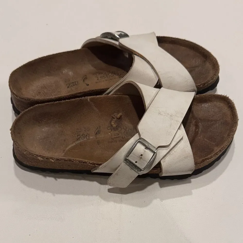 Birkenstock White Cross-Strap Sandals with Silver Buckles