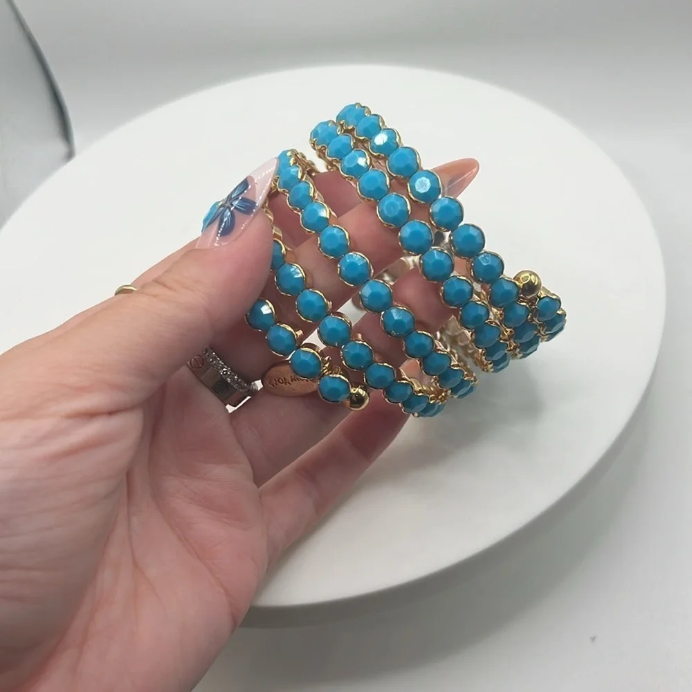 1349. Cara‎ New York Elegant Gold and Blue Wraparound Bracelet