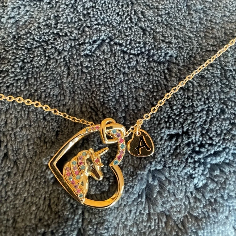 Gold unicorn heart and letter “A” necklace