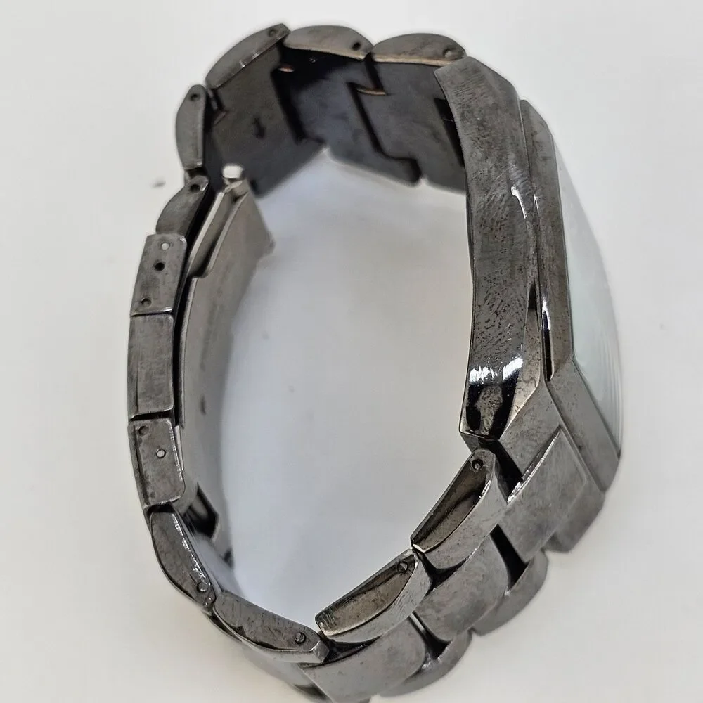Kenneth Cole used working