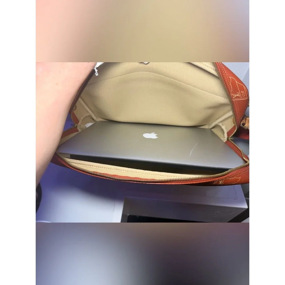 Louis Vuitton sleek reddish