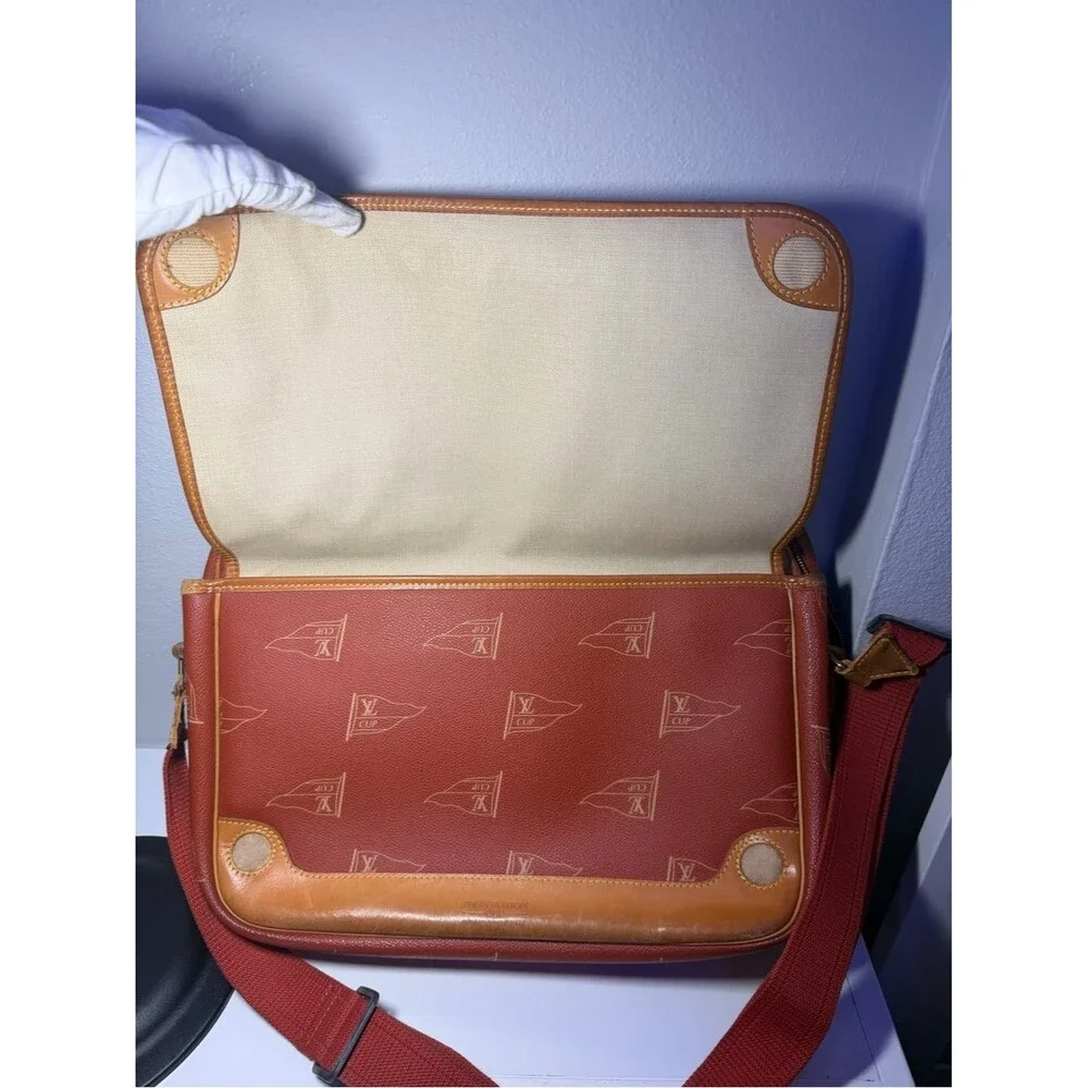 Louis Vuitton sleek reddish