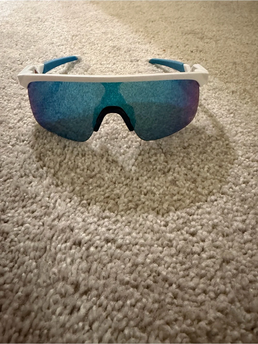 Oakley White Frame Sunglasses with Blue Temples and Purple Lenses