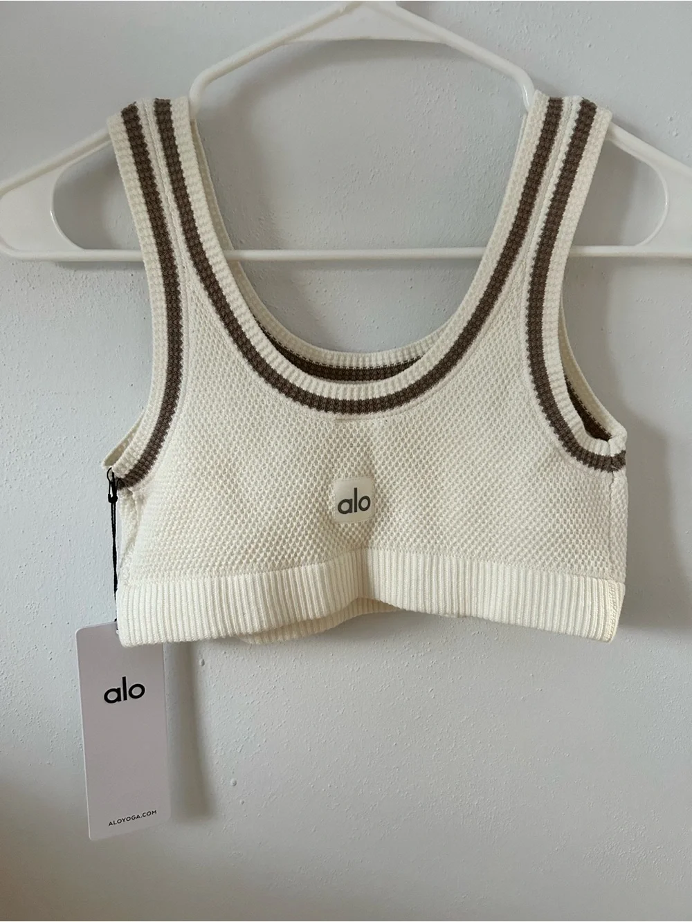 ALO Yoga Cream Knit Sports Bra with Brown Trim