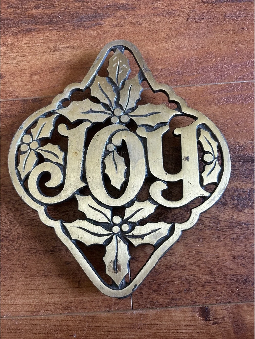 Vintage Cast Iron 'Joy' Trivet with Holly Leaf Design