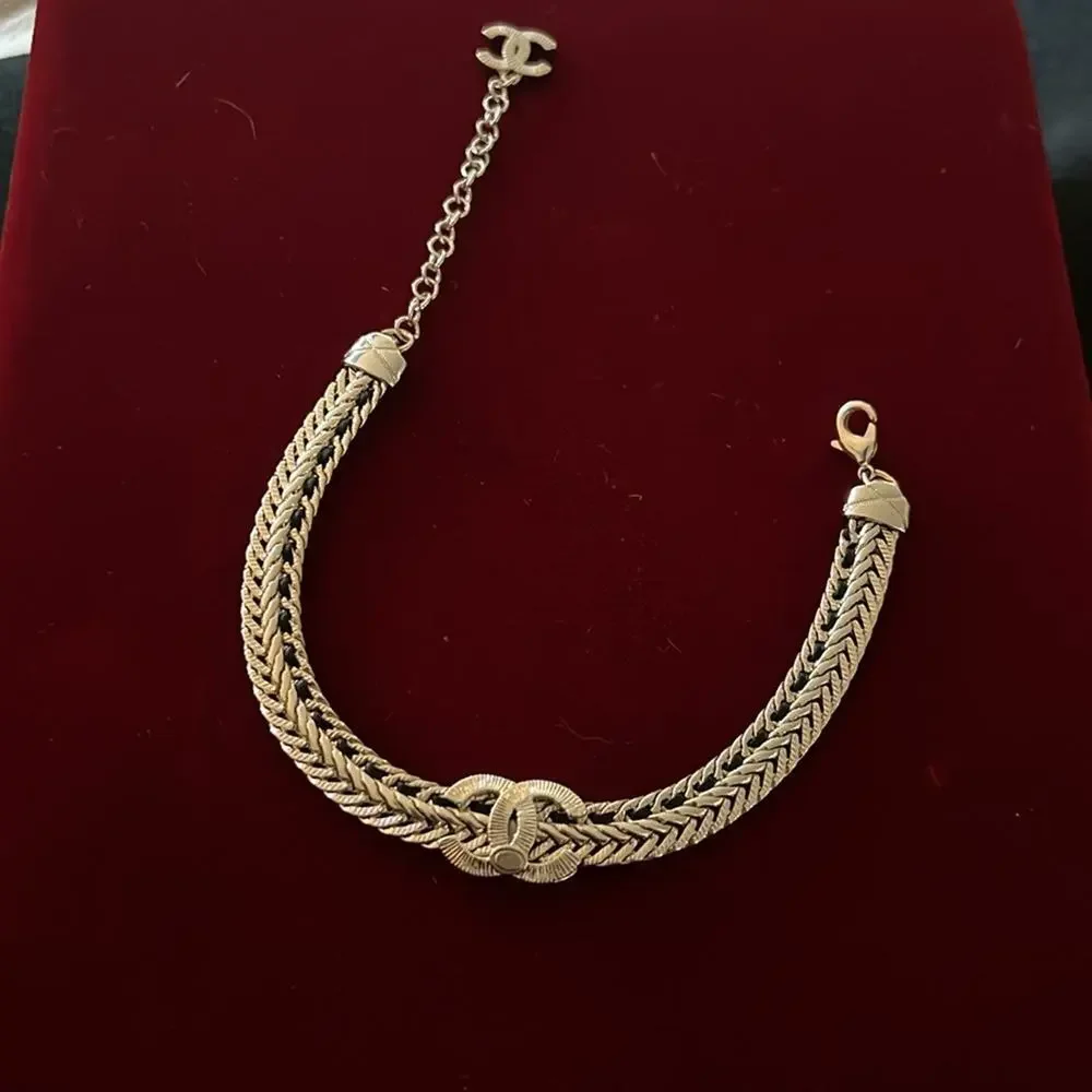 CHANEL gold tone