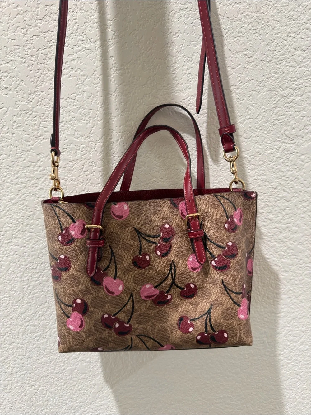 Coach tote featuring