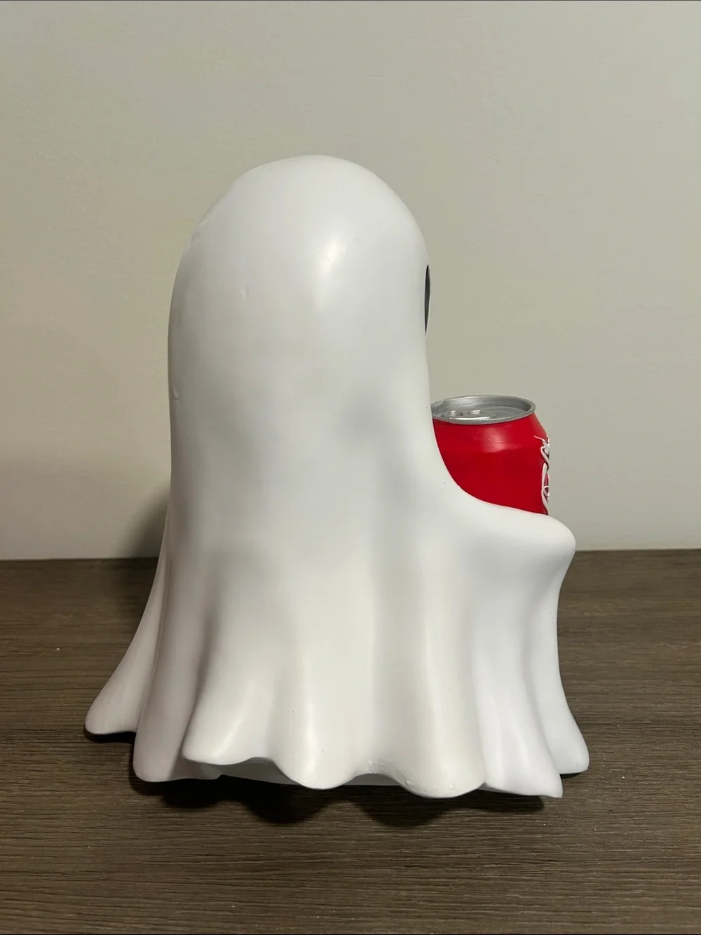 Ghost Holding Coke Can