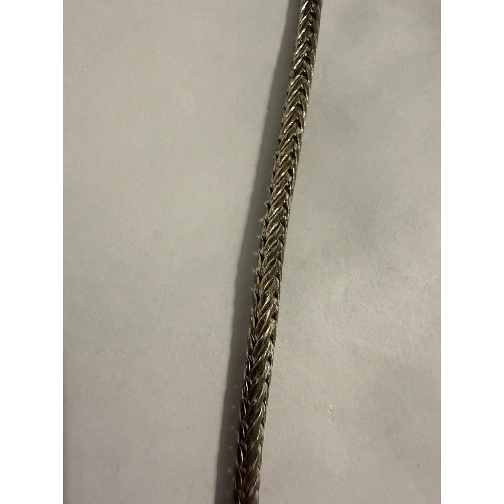 Unbranded ornate silver