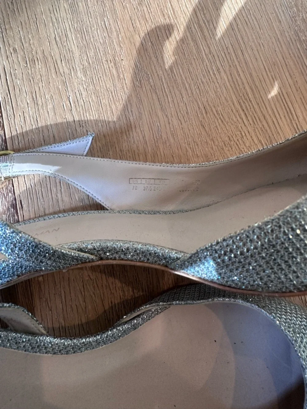 Stuart Weitzman refined glitter silhouette