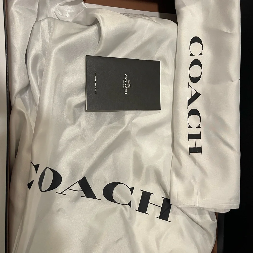 Coach sleek black