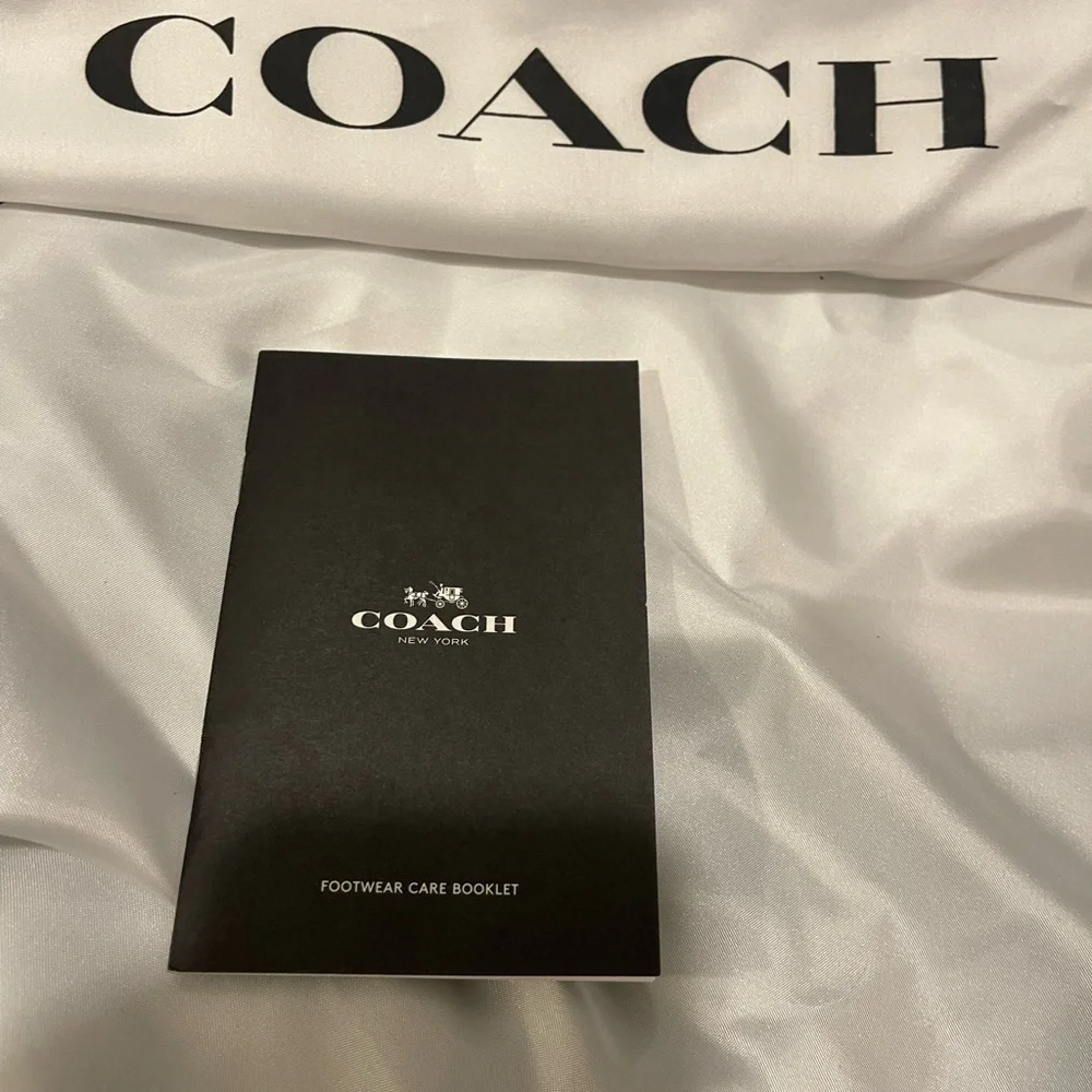 Coach sleek black