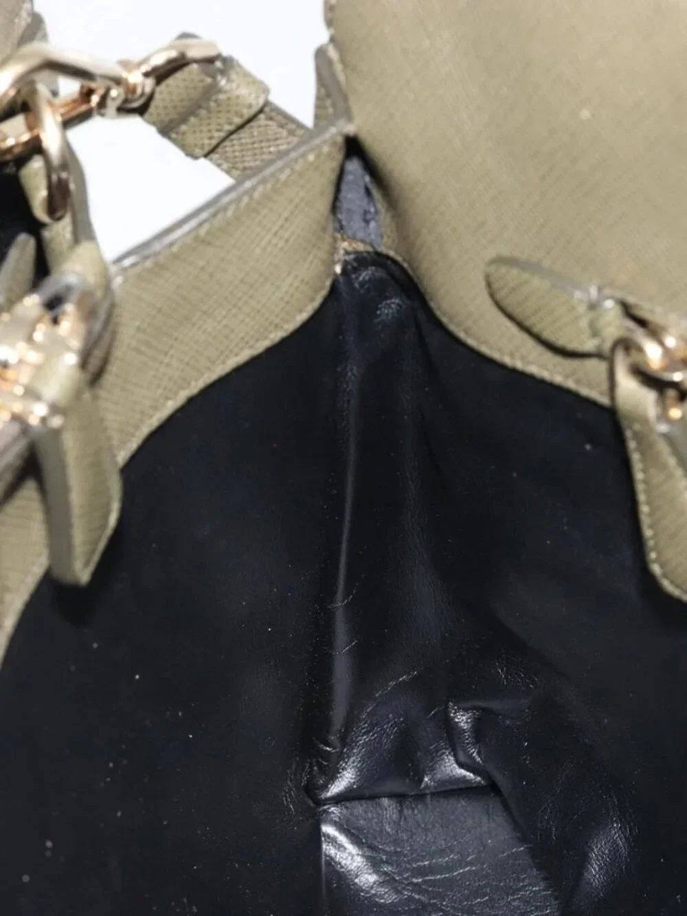 Prada 17 inside	slight gold