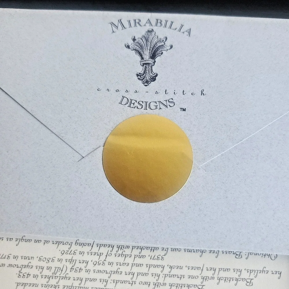 Mirabilia kiss cross