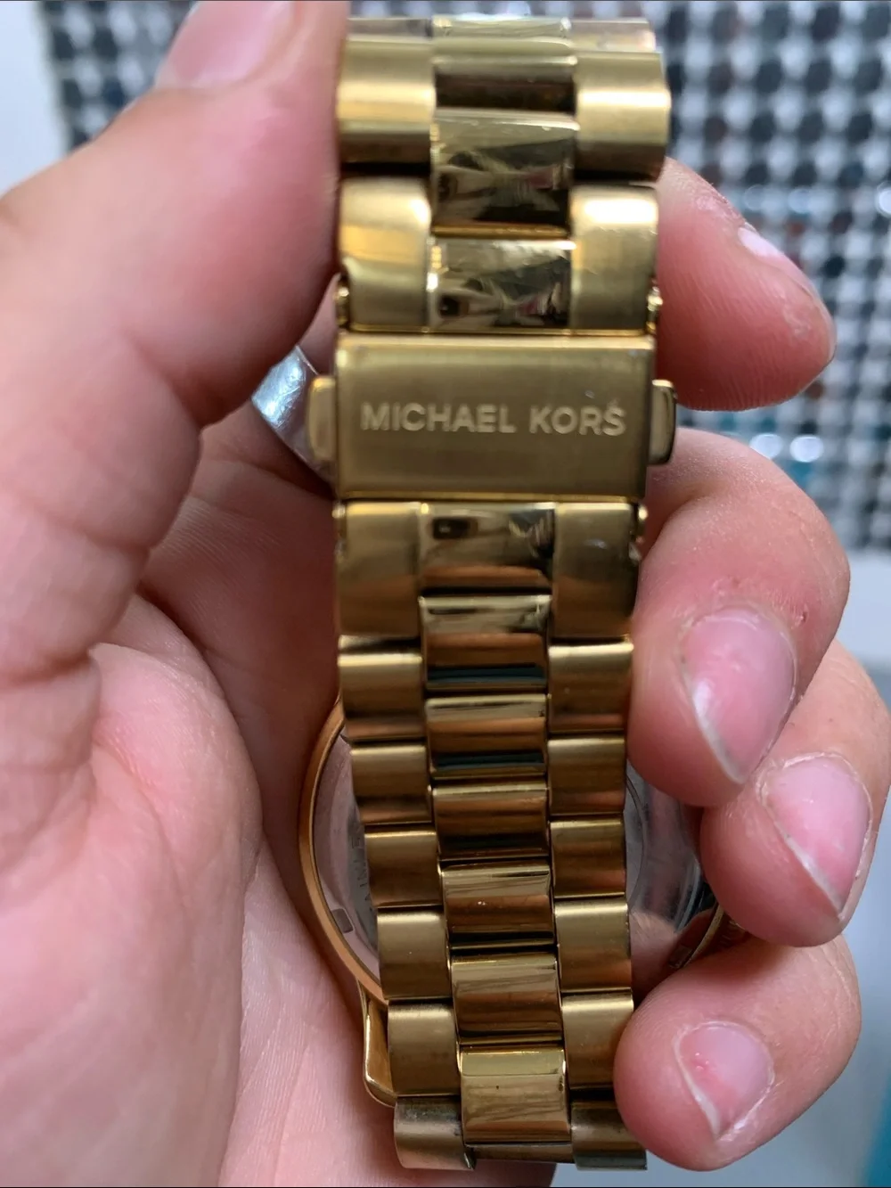 Michael Kors gold tone