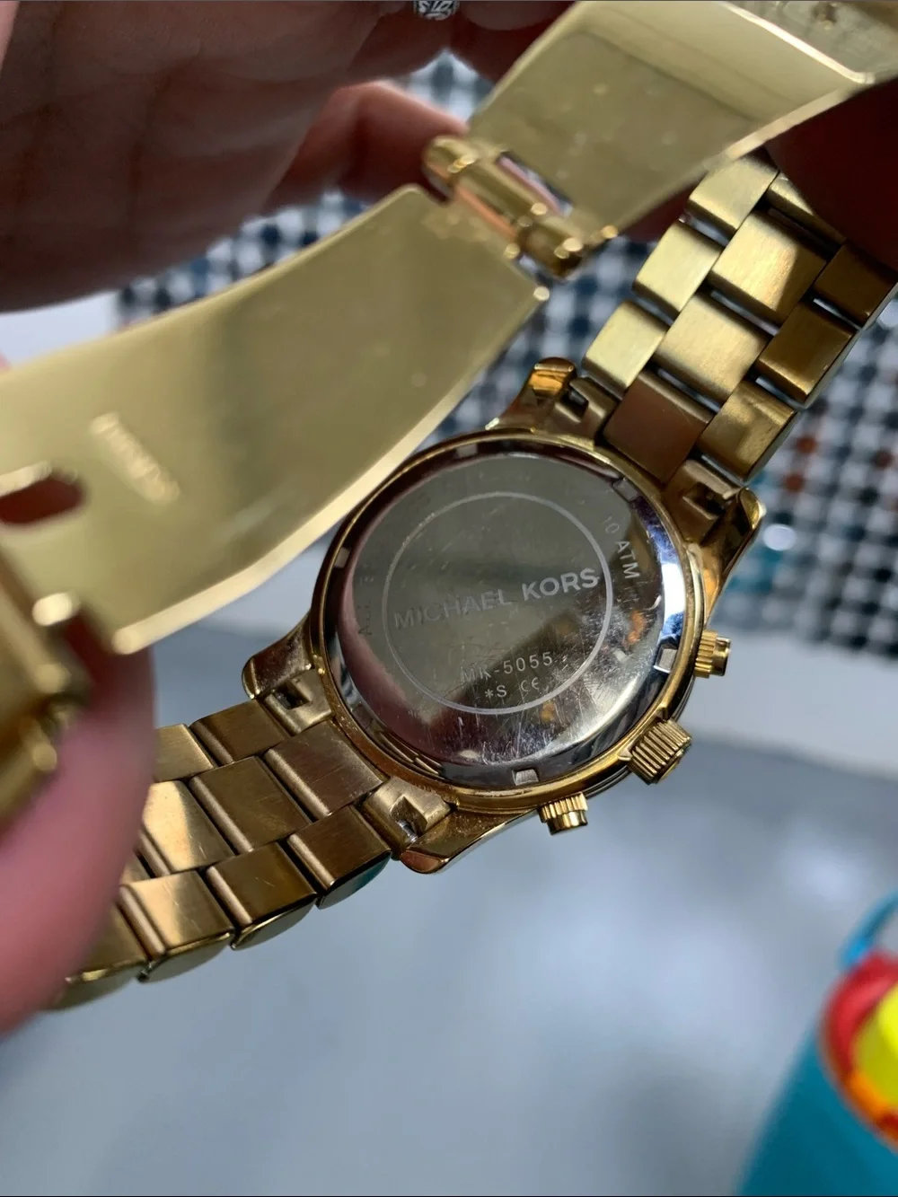 Michael Kors gold tone