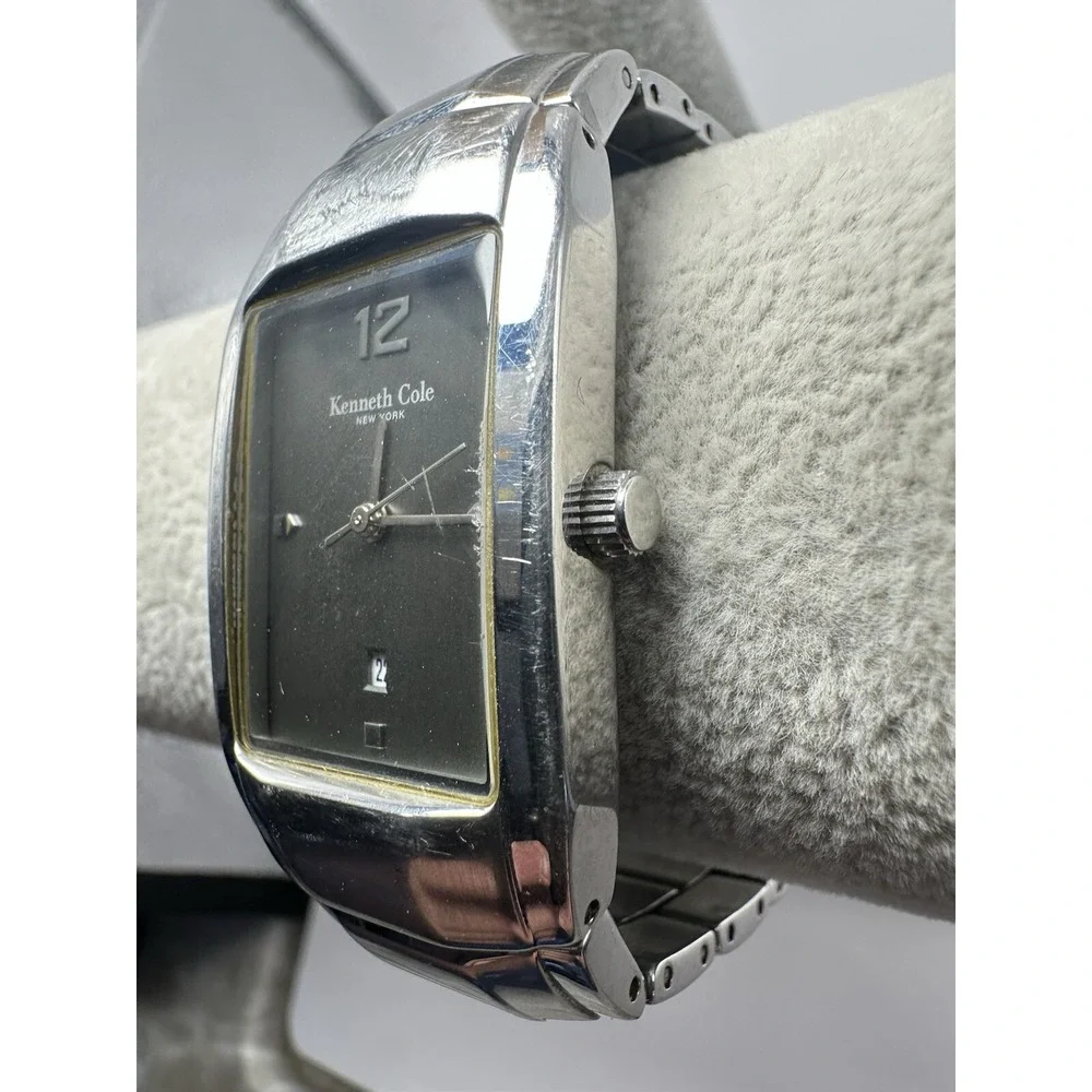 Kenneth Cole it showing