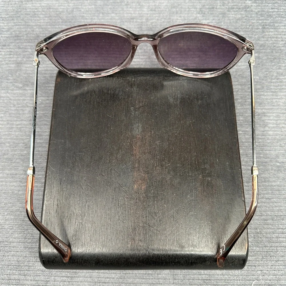 Revlon sunglasses featuring