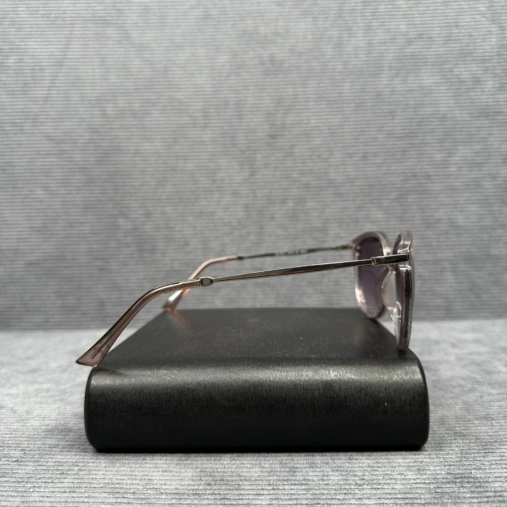 Revlon sunglasses featuring