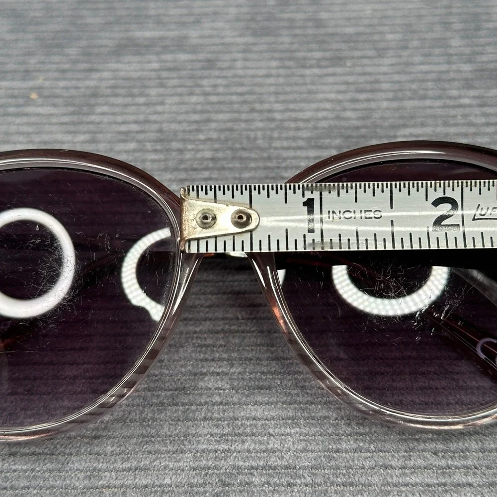 Revlon sunglasses featuring