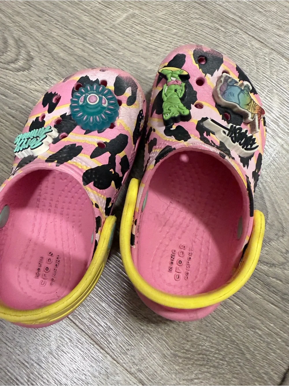 CROCS Kids Pink Leopard Print Clogs with Yellow Strap and Charms