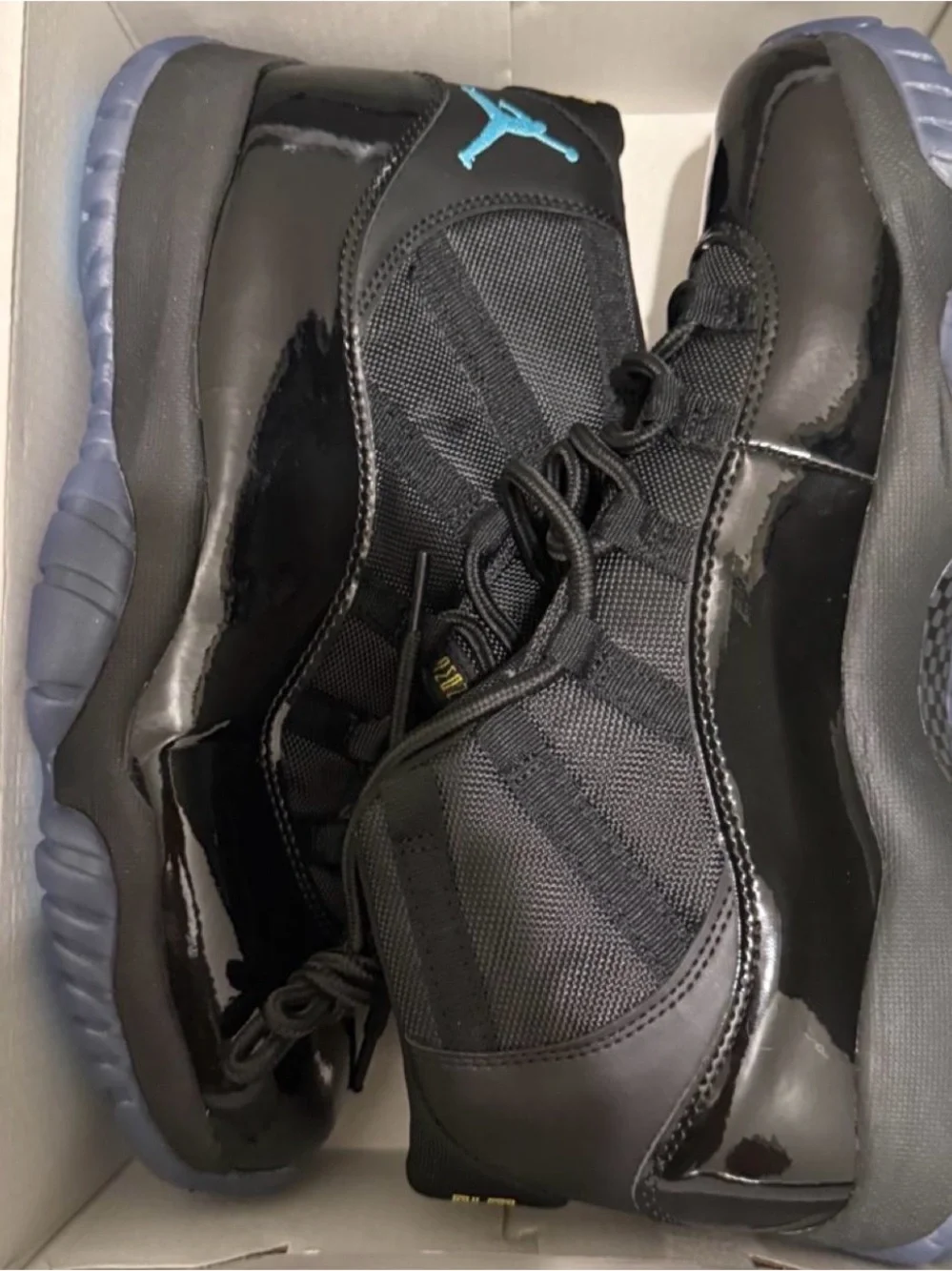 Jordan Men’s Black Sneakers with Blue Jumpman Accent