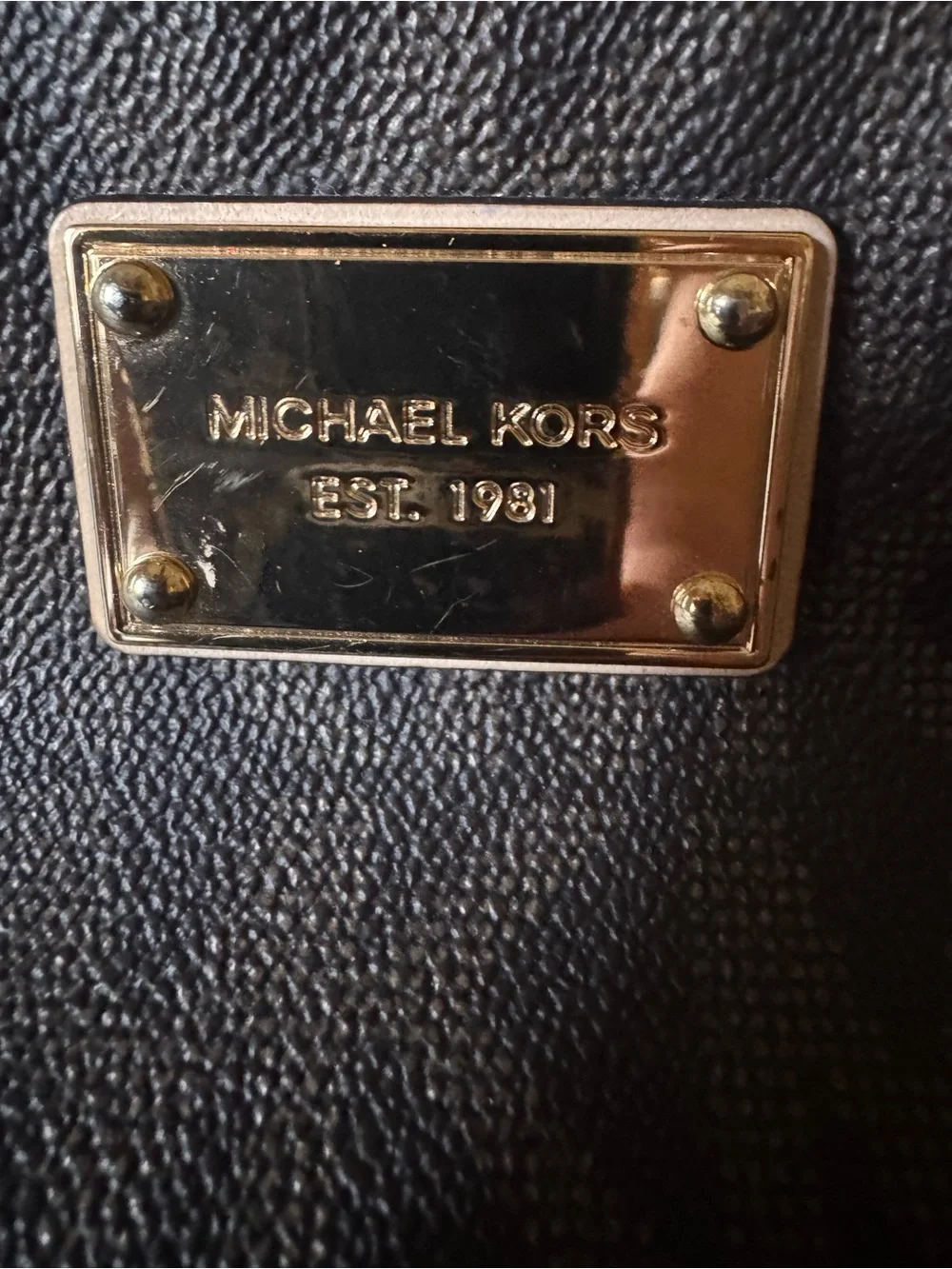 Michael Kors compact cosmetic