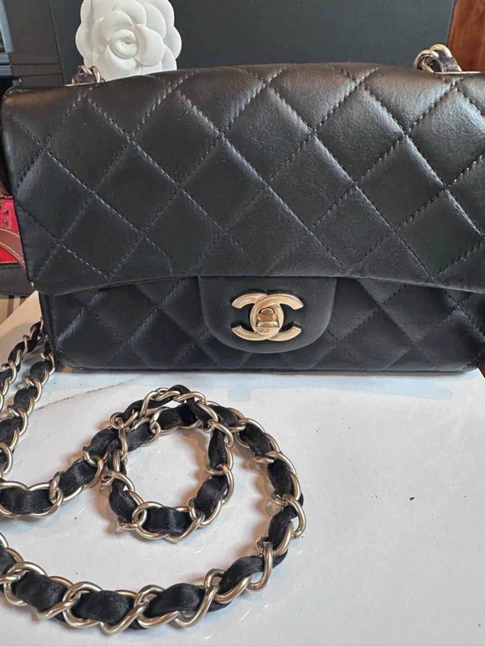 CHANEL strap drop