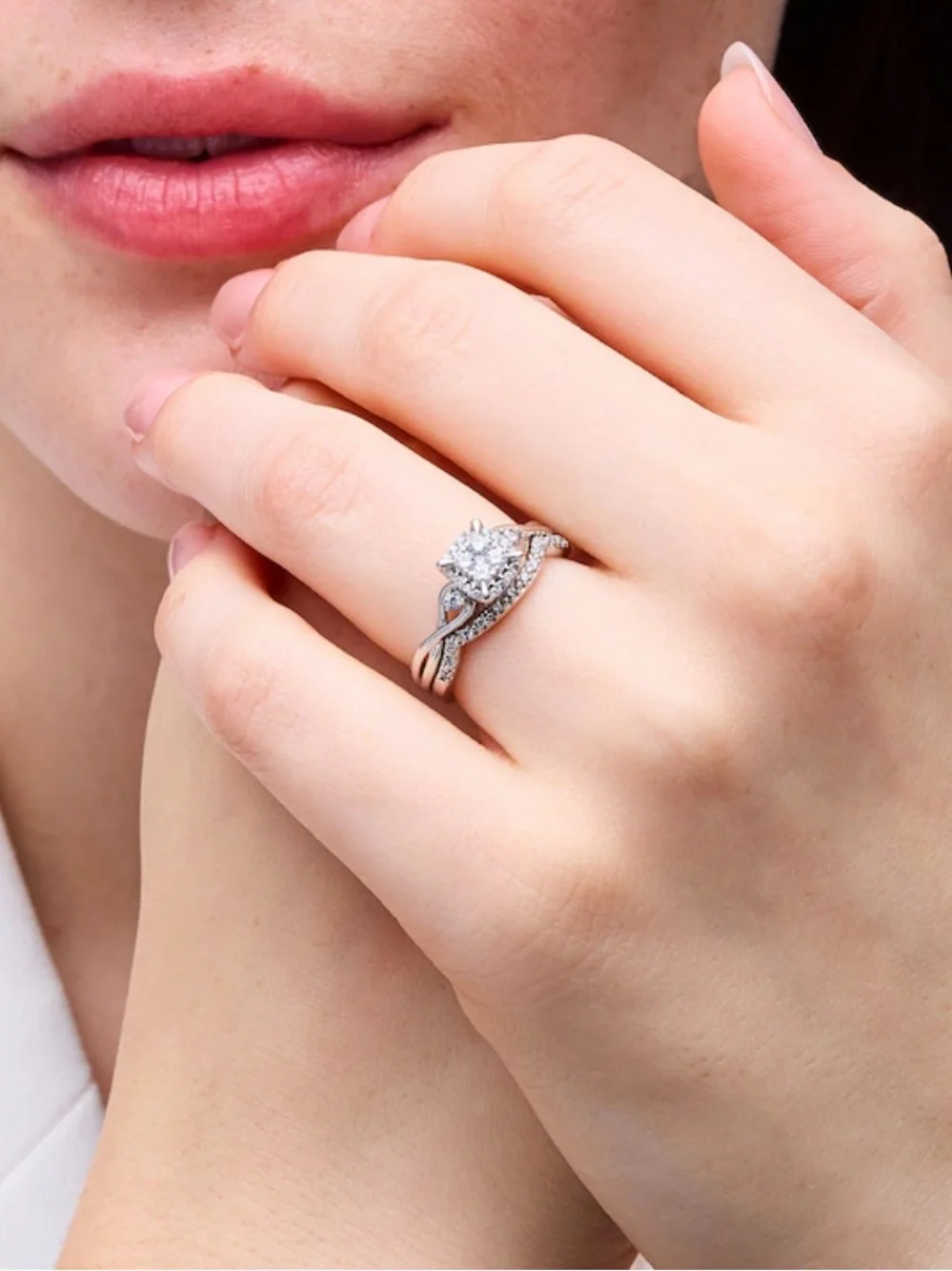 1/3 CT. T.W. Multi-Diamond Twist Shank Bridal Set in 10K White Gold  SIZE:7