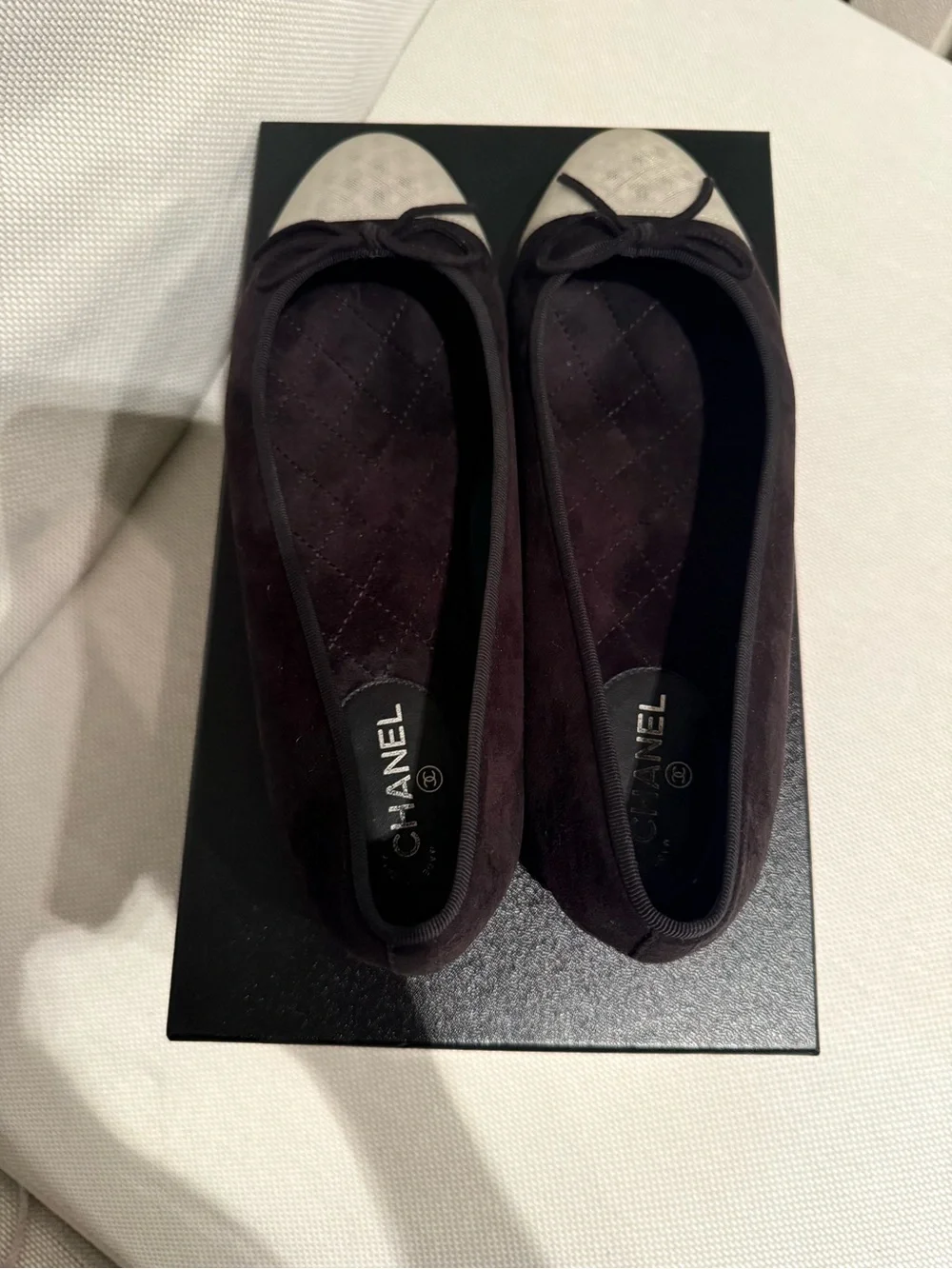 CHANEL black suede Ballet Flats with Cream Patterned Cap Toe