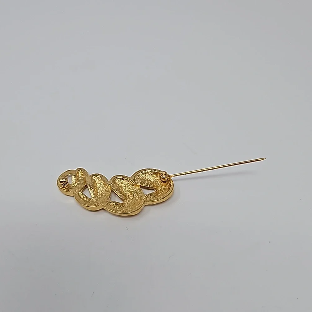 Avon gold tone