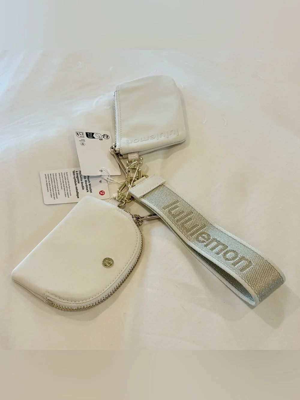 NWT Lululemon Dual Pouch Wristlet Metallic Wordmark Light Ivory Gold Cream