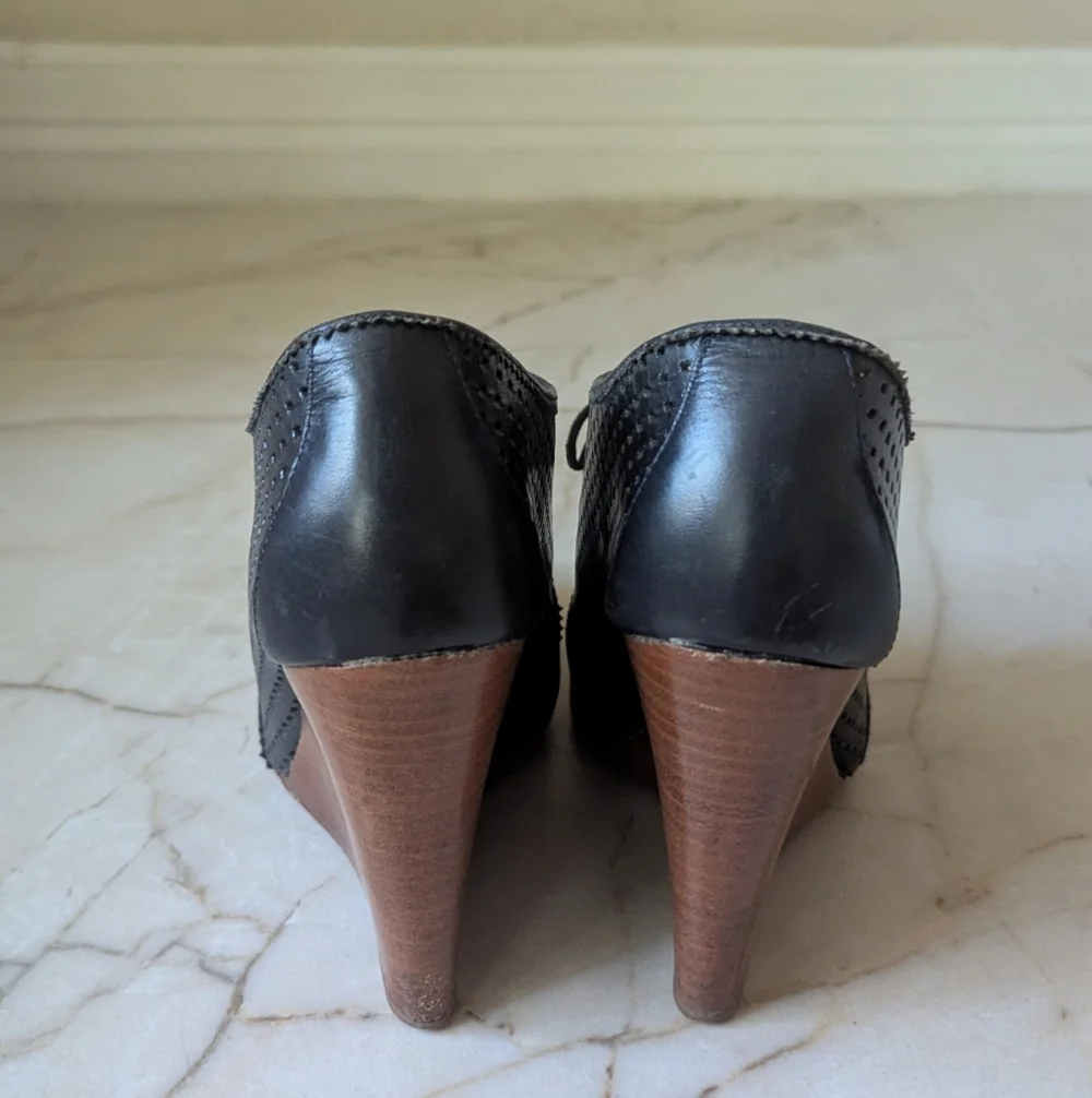 Tory Burch perforations give