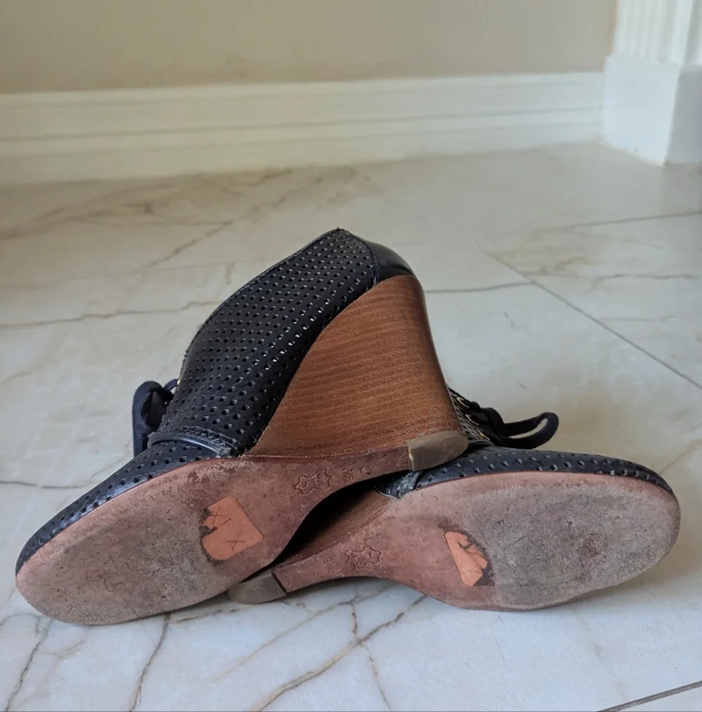Tory Burch perforations give