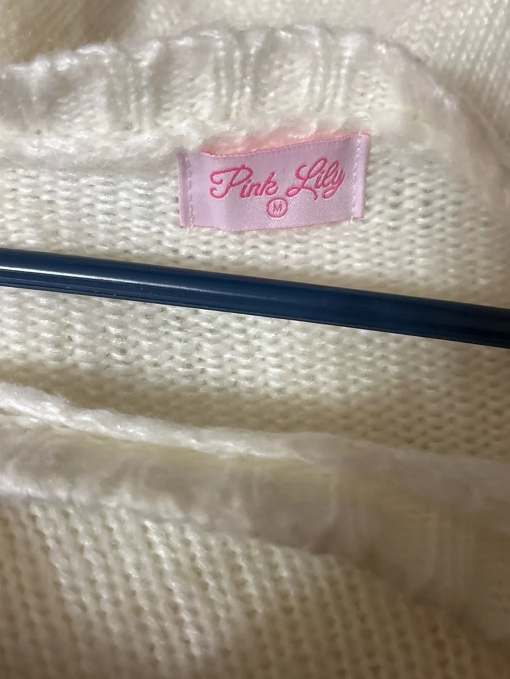 Pink Lily cream knit