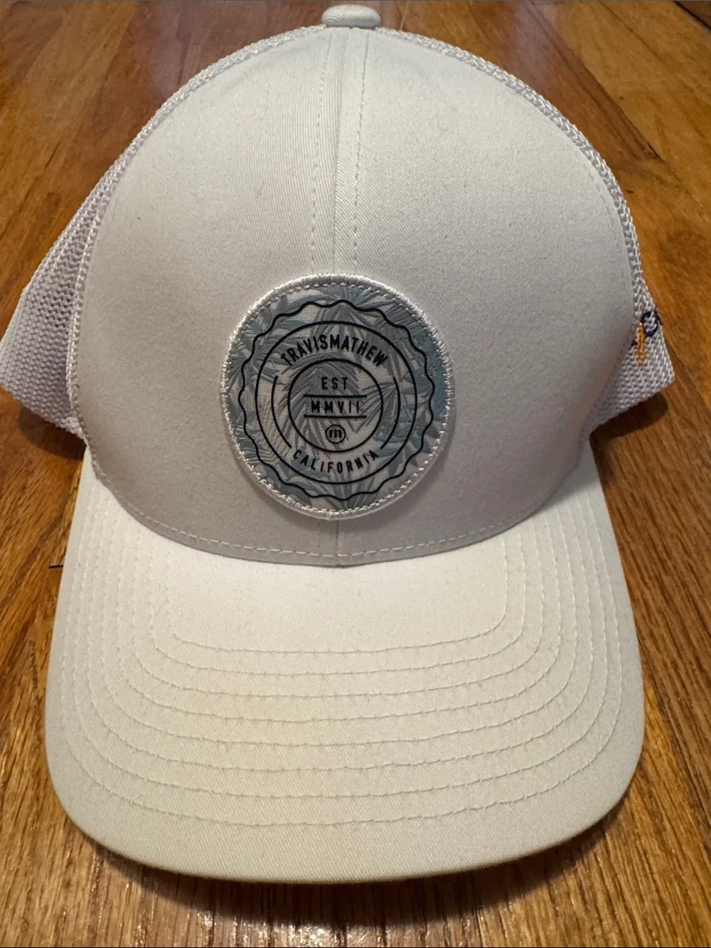 Travis Mathew Men’s white Patch Trucker Hat