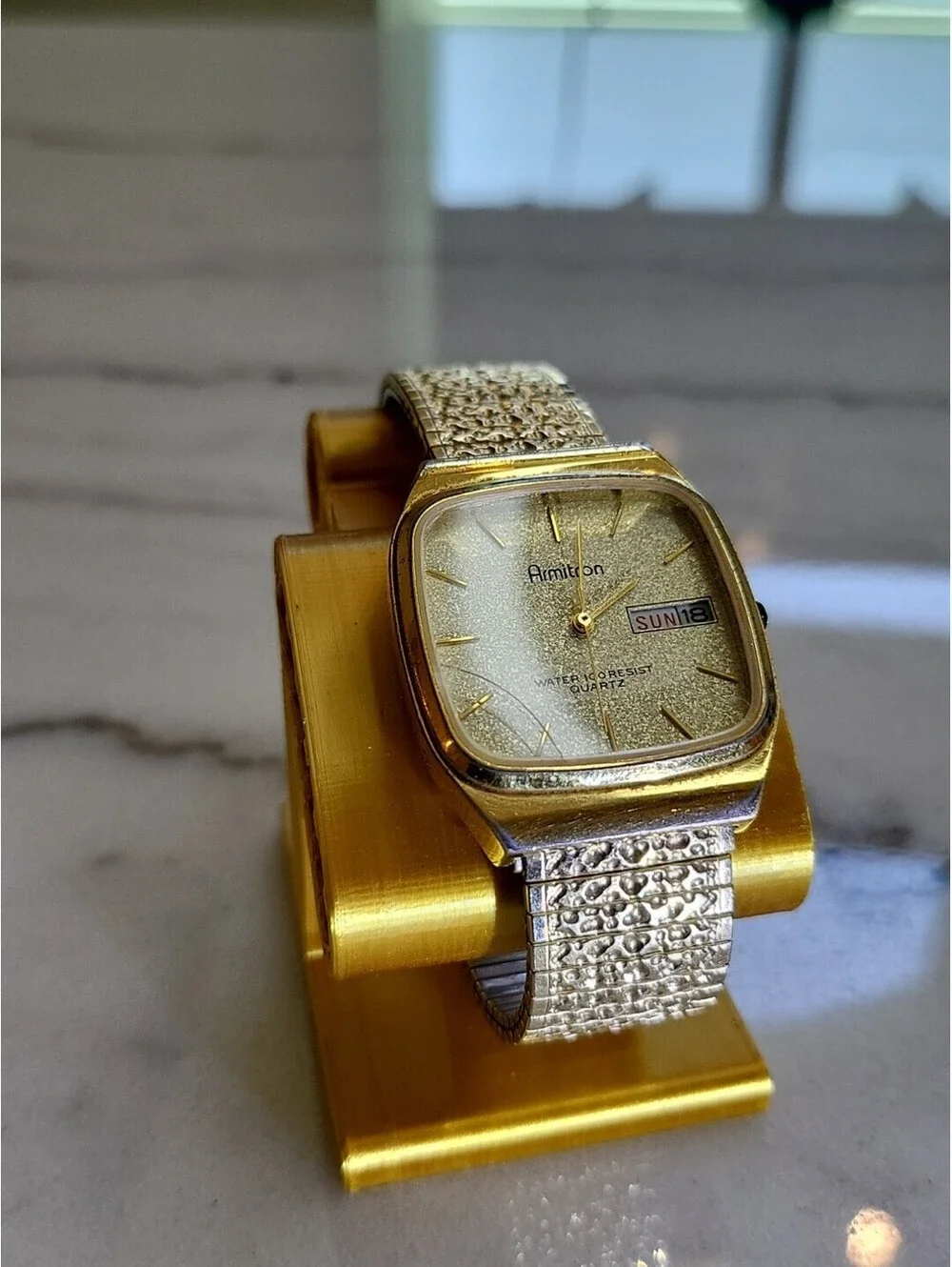 Armitron Men’s Watch Dust Gold Tone TankDate DayDial Nugget Band New Batt. 31mm