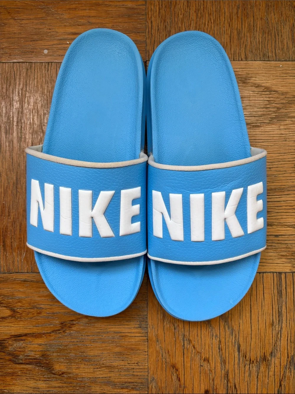 Nike Men’s Light Blue Slide Sandals with White NIKE Logo