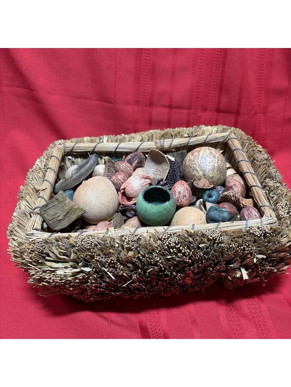 woven grass basket assortment of dried botanical potpourri
