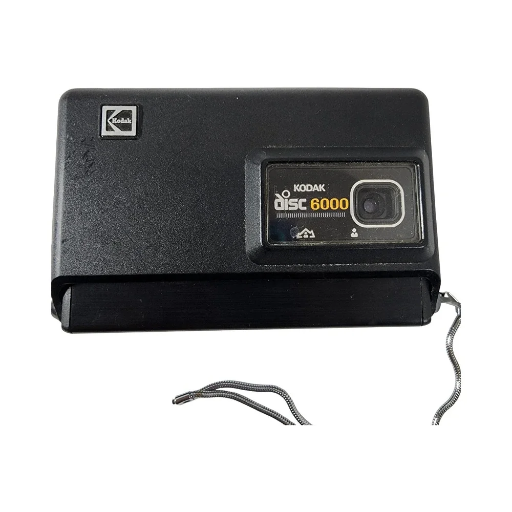 Kodak Disc 6000 Vintage Film Camera Black with Wrist Strap and Film Cartridge‎