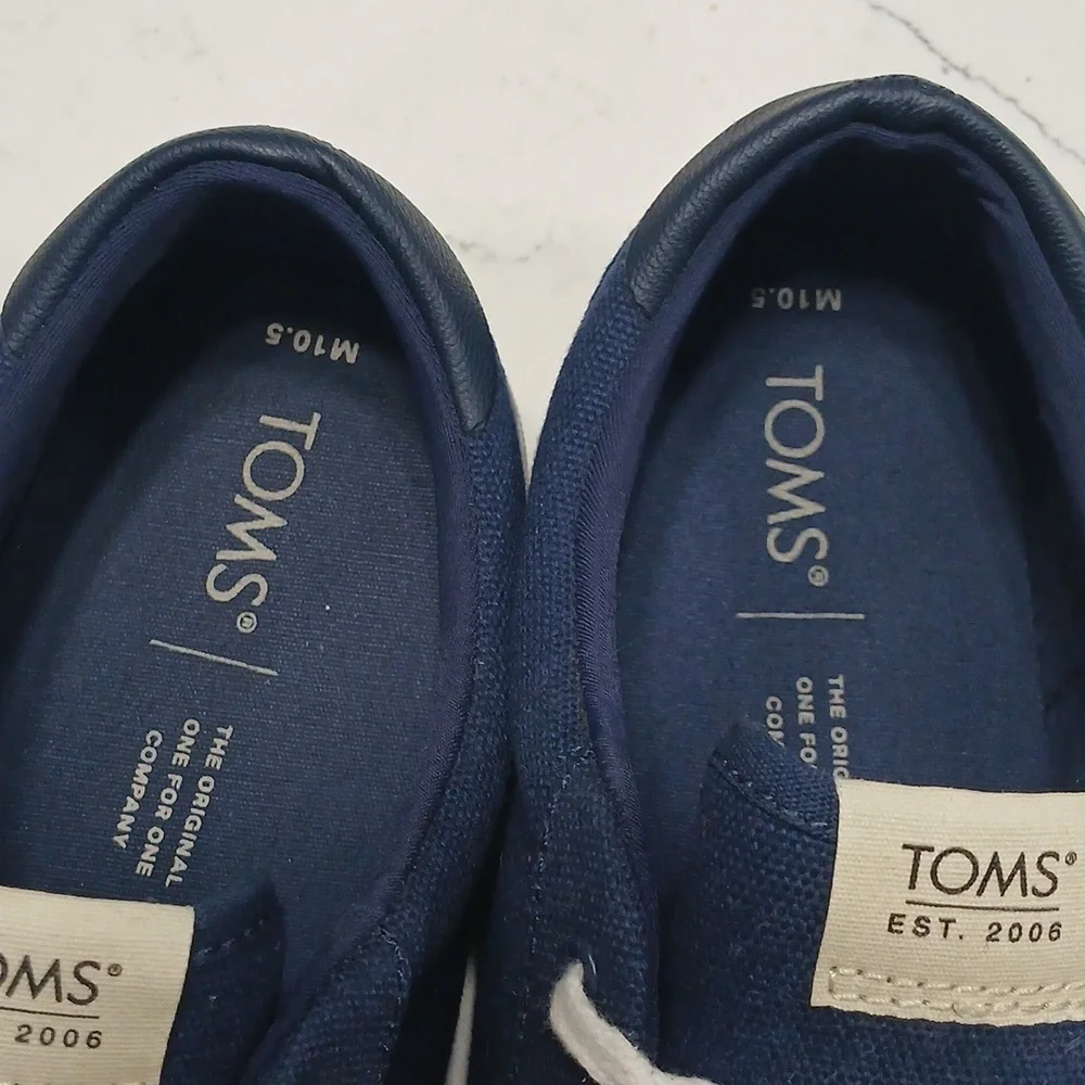 Toms step out