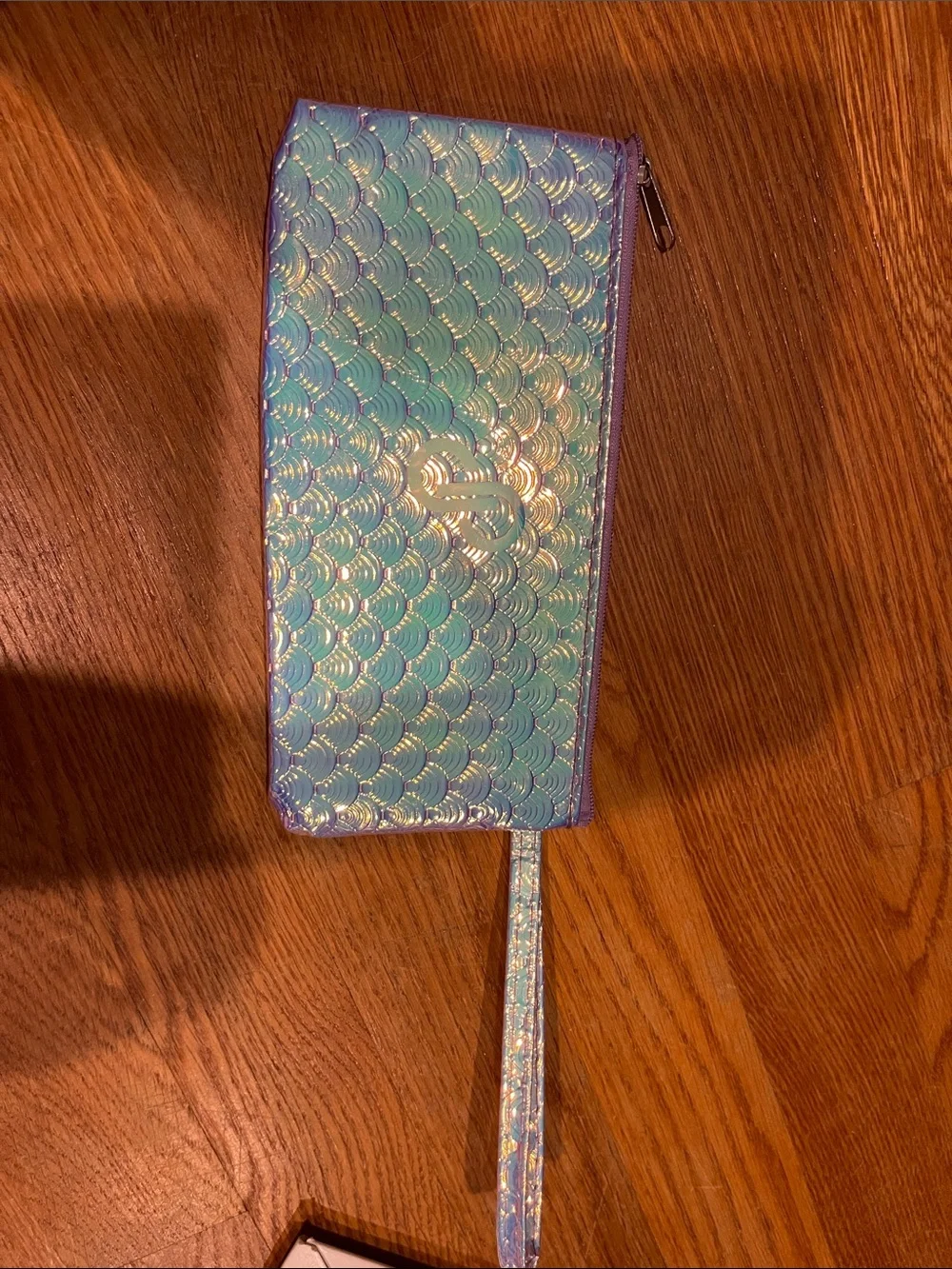 Boss iridescent wristlet