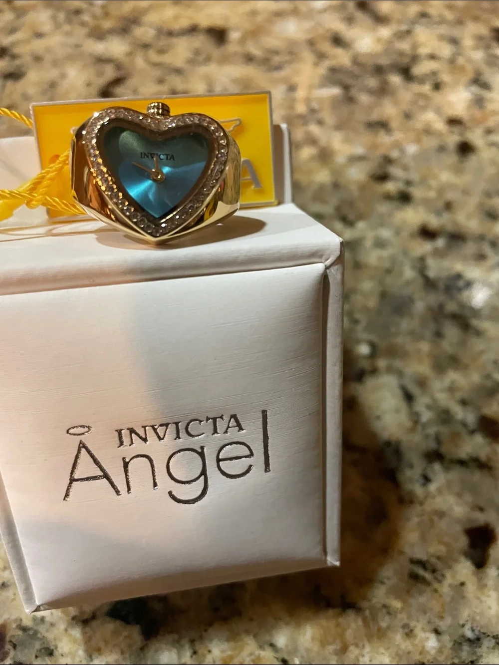 Invicta gold toned