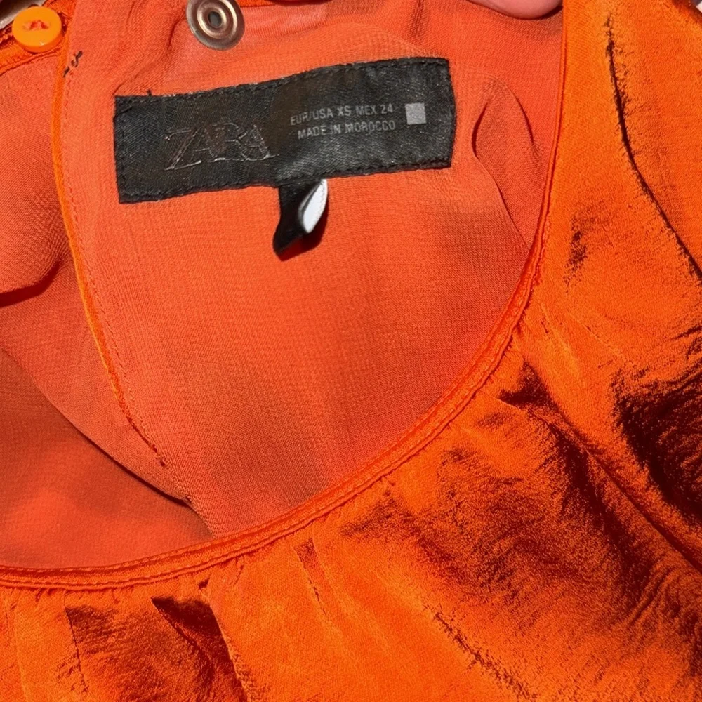 Zara orange gathered