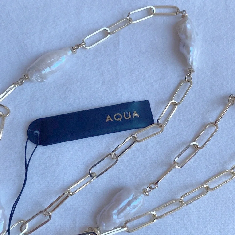 Aqua gold tone