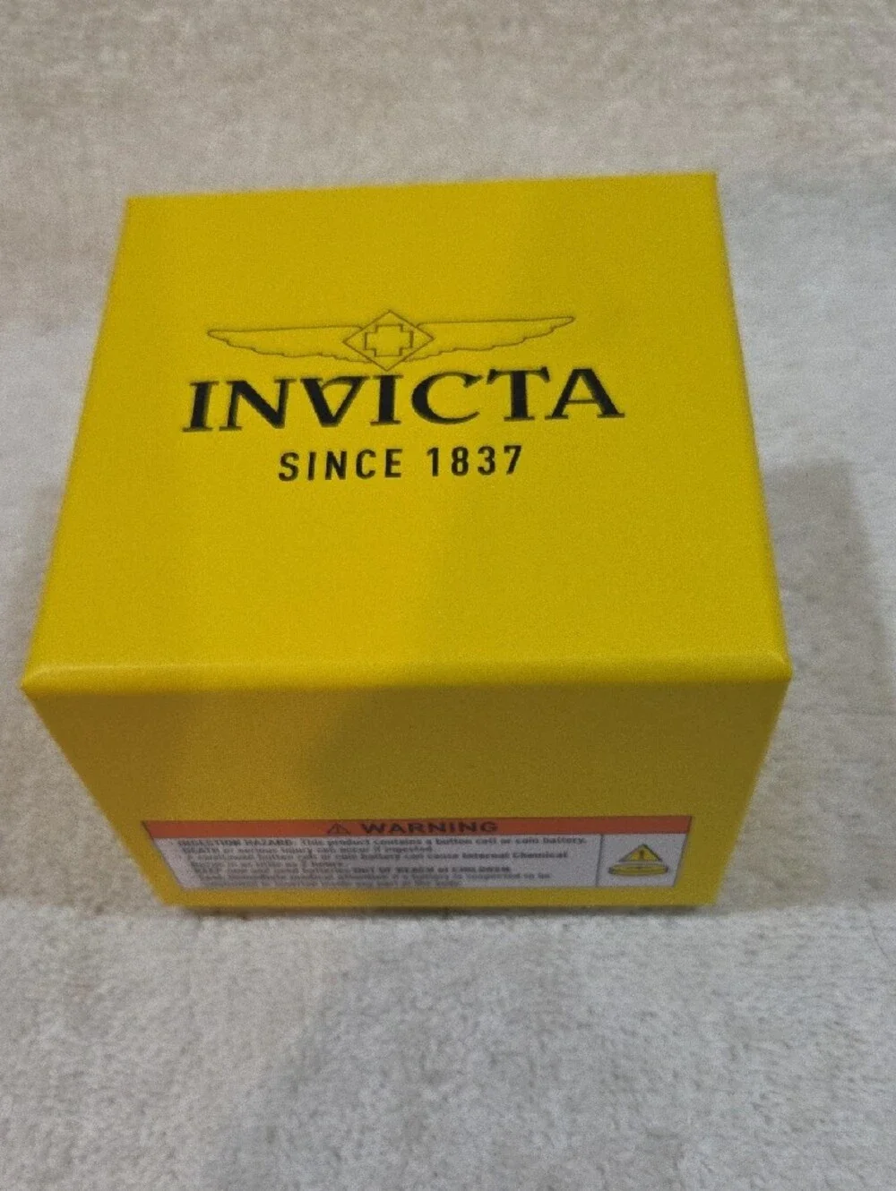 Invicta polished gold