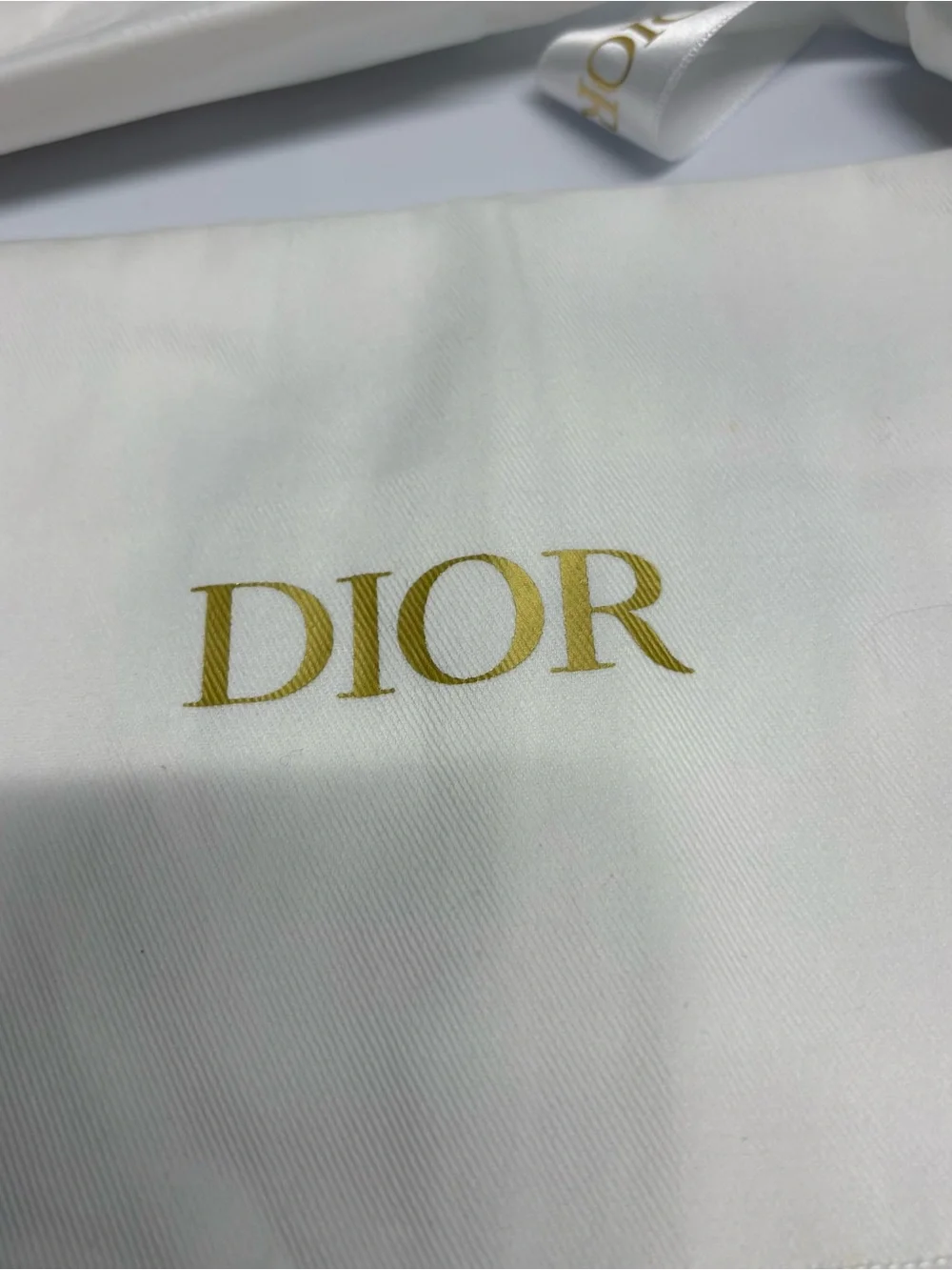 Dior gold tissue measure