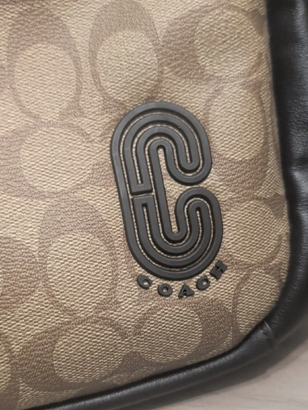 Coach sleek front