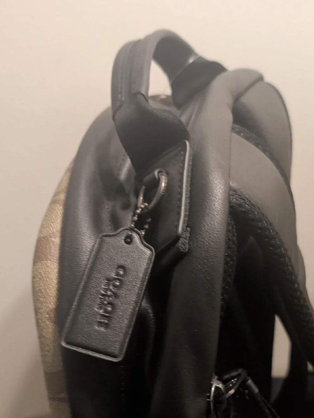 Coach pockets handle