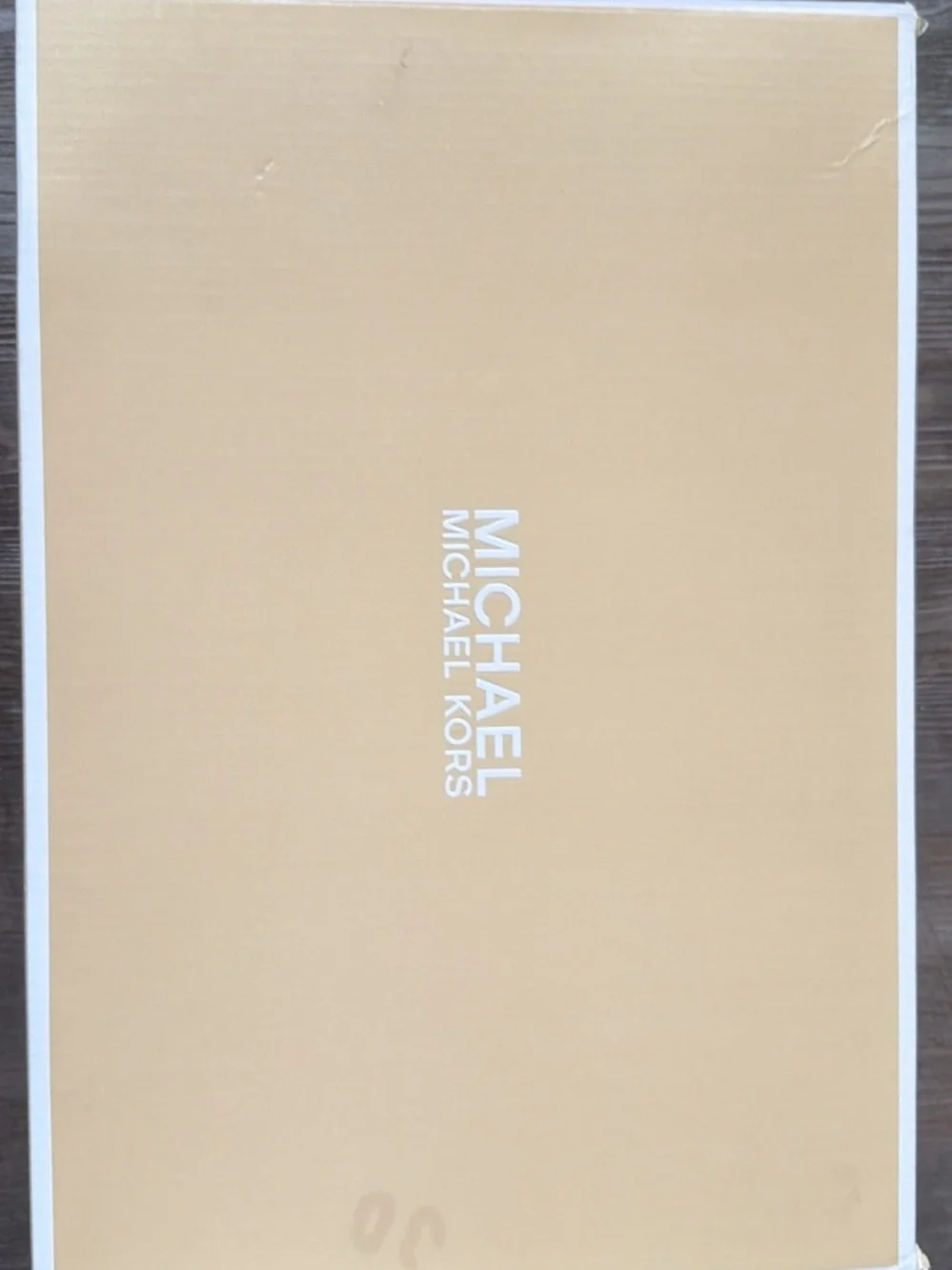 Michael Kors gold silhouette boots